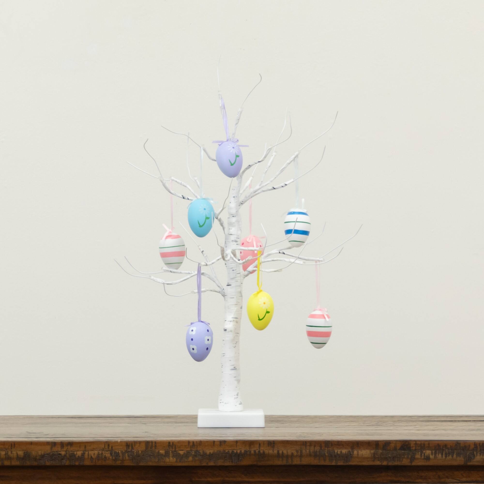 2ft. Pre-Lit Artificial Easter Twig Tree with Egg Ornaments and 24 Warm White LED Lights